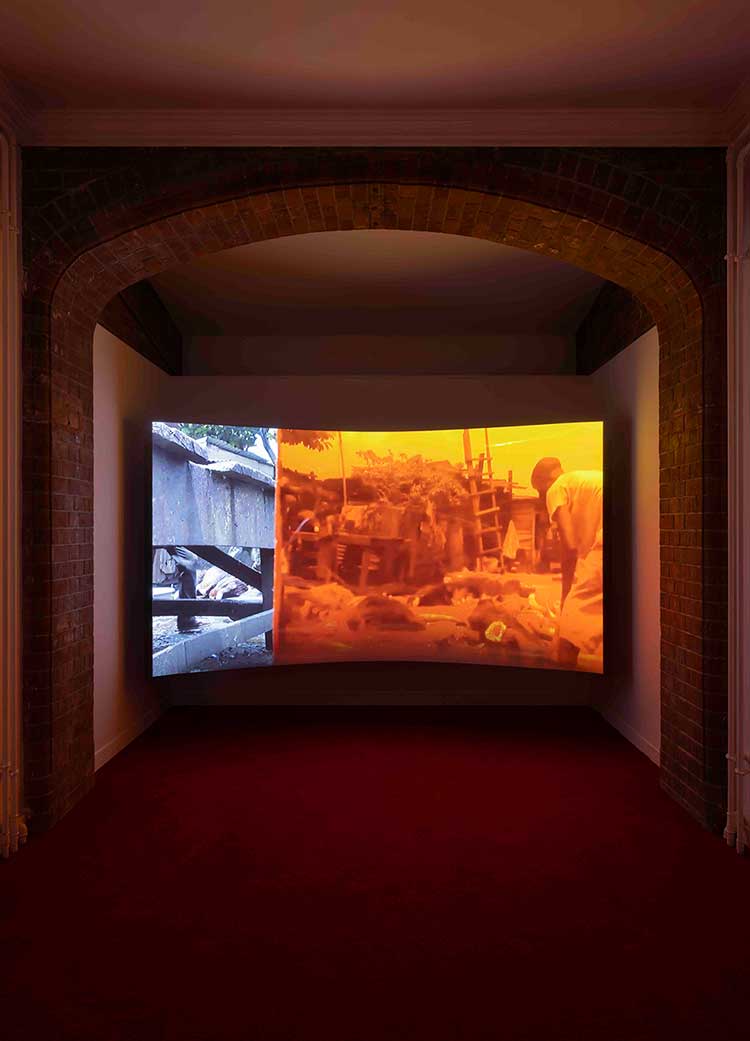 Karimah Ashadu, King of Boys (Abattoir of Makoko), 2015. HD digital film, colour with sound, 5 mins. Installation view, Camden Art Centre, 2025. Courtesy the artist, Fondazione In Between Art Film, Sadie Coles HQ, London and Camden Art Centre. Photo: Andrea Rossetti.