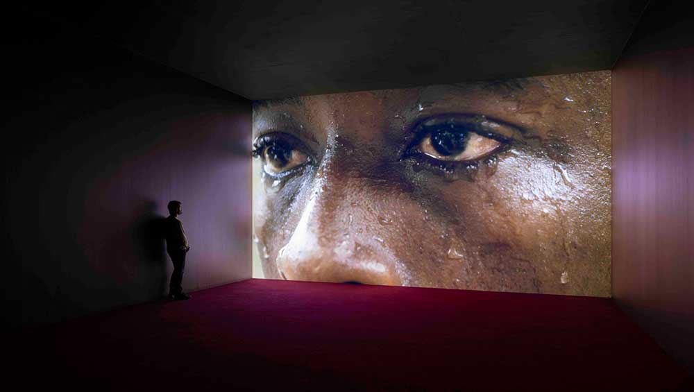 Karimah Ashadu, Muscle, 2025. HD digital film, colour with sound. single channel. Installation view, Camden Art Centre, 2025. Courtesy the artist, Fondazione In Between Art Film, Sadie Coles HQ, London and Camden Art Centre. Photo: Andrea Rossetti.