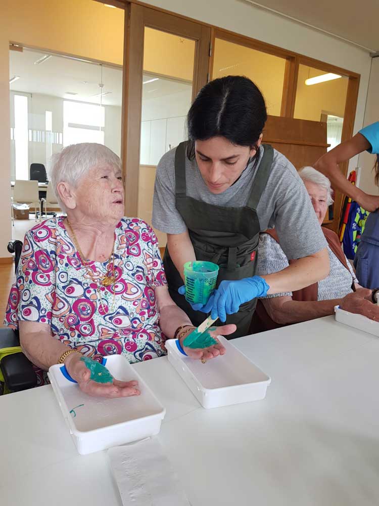 Selva Aparicio and participant at workshop for At Rest. Photo courtesy Selva Aparicio.