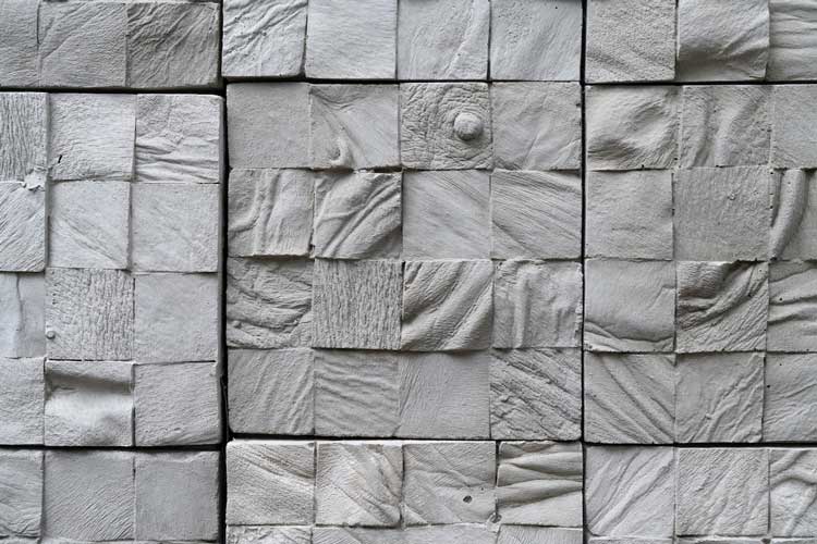 Selva Aparicio. Entre Nosotros (Among Us), 2017 (detail). Installation of 6 x 6 in (15 x 15 cm) concrete tiles cast from nearly 100 human cadavers. Photo courtesy Selva Aparicio.