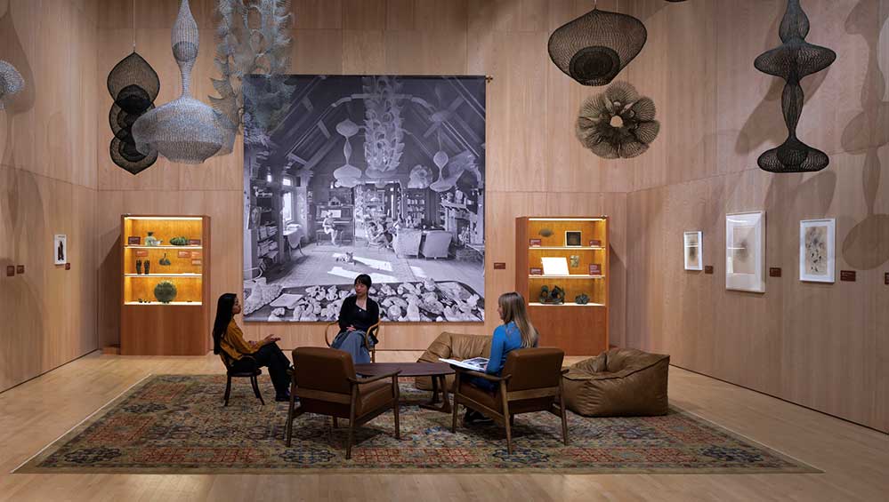 Ruth Asawa: Retrospective, installation view, SFMOMA; artwork: © 2025 Ruth Asawa Lanier, Inc., courtesy David Zwirner; backdrop photograph: © 2025 Rondal Partridge Archives; Photo: Henrik Kam.