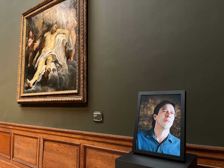 Suffering-themed room with Bill Viola's Man of Sorrows (2001) (right) and The Holy Trinity (1620) attributed to the atelier of Peter Paul Rubens. Photo: Veronica Simpson.
