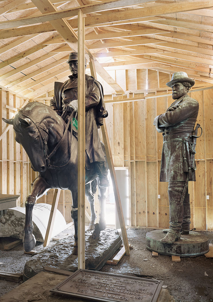 An-My Lê. Fragment VI: Generals Robert E. Lee and P.G.T. Beauregard, Monuments, Homeland Security Storage, New Orleans, Louisiana, from The Silent General, 2017. Pigment print, 56 1/2 x 40 in (143.5 x 101.6 cm). © An-My Lê. Courtesy the artist and Marian Goodman Gallery New York, Paris and London.