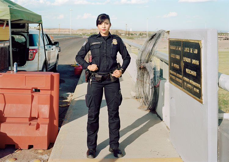 An-My Lê. Fragment VIII: US Customs and Border Protection Officer, Presidio-Ojinaga International Bridge, Presido, Texas, from The Silent General, 2019. Pigment print, 56 1/2 x 40 in (143.5 x 101.6 cm). © An-My Lê. Courtesy the artist and Marian Goodman Gallery New York, Paris and London.