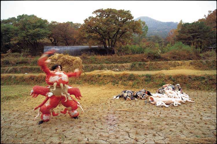 Lee Bul. Cravings, 1988. Performance still, Outdoor performance, Jang-heung, Korea. © Lee Bul. Courtesy of the artist.