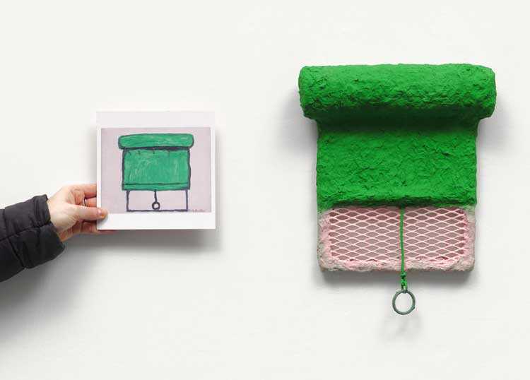 Olivia Bax with a postcard of Philip Guston's Shade (1972) next to Bax's Guston's View II, 2024. Steel, steel mesh, foam, cardboard, newspaper, PVA, household paint, aluminium wire, curtain ring, 36 x 28 x 6 cm. Photo: Tim Bowditch.