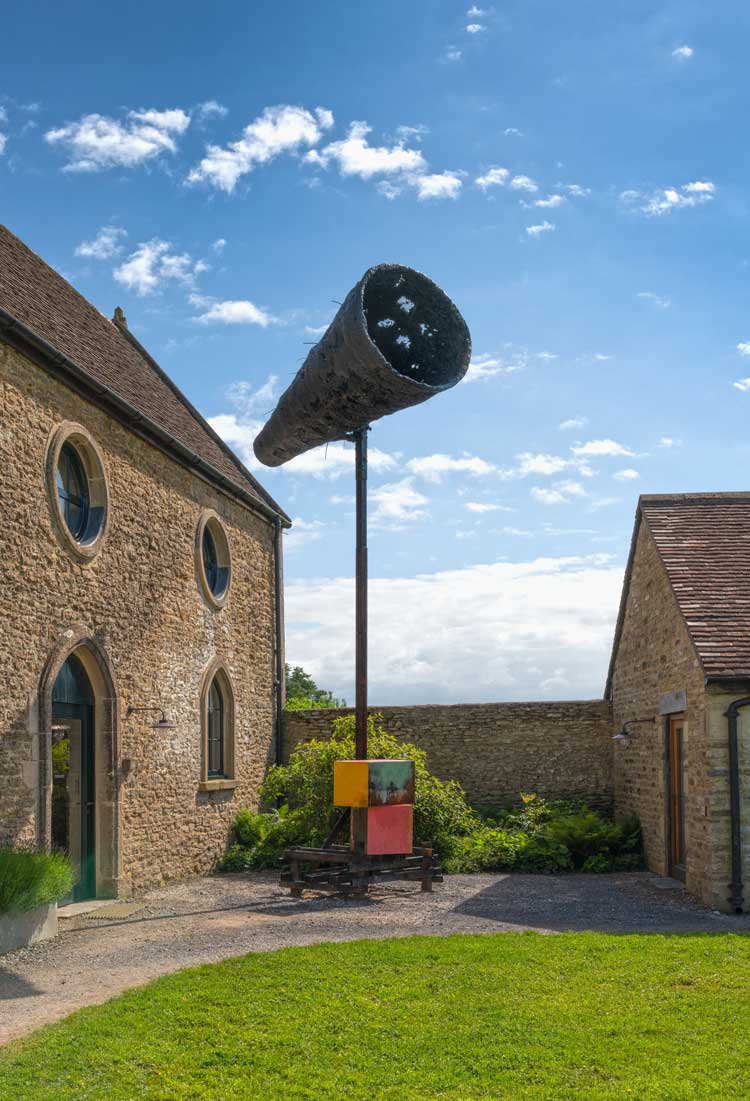 Untitled: Megaphone, 2014. Steel, timber, plywood, wirenetting, sand, polyurethane foam, polystyrene, paint, varnish, 600 x 235 x 290 cm. Installation view, Phyllida Barlow. Unscripted, Hauser & Wirth Somerset, 2024. © Phyllida Barlow Estate. Courtesy Phyllida Barlow Estate and Hauser & Wirth. Photo: Ken Adlard.