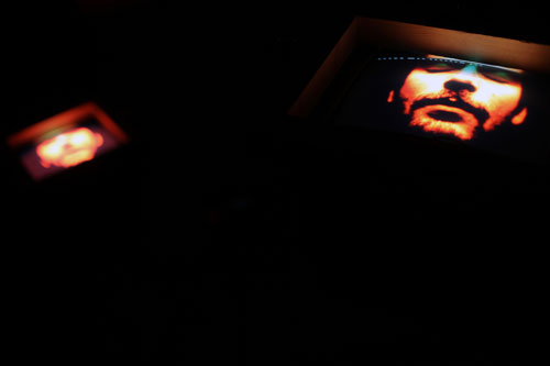 Toby Ross-Southall. Being Silent Isn't Strong (Installation View 2), 2010. DVD loop, chain, wood, TVs, mirror, dimensions variable. © the artist.