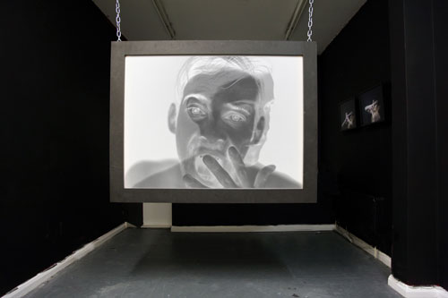 Toby Ross-Southall. Empirical Provocations, (Installation View), 2010. 144 slides, slide projectors, chain, rear projection PVC screen mounted in box frame, dimensions variable. © the artist.