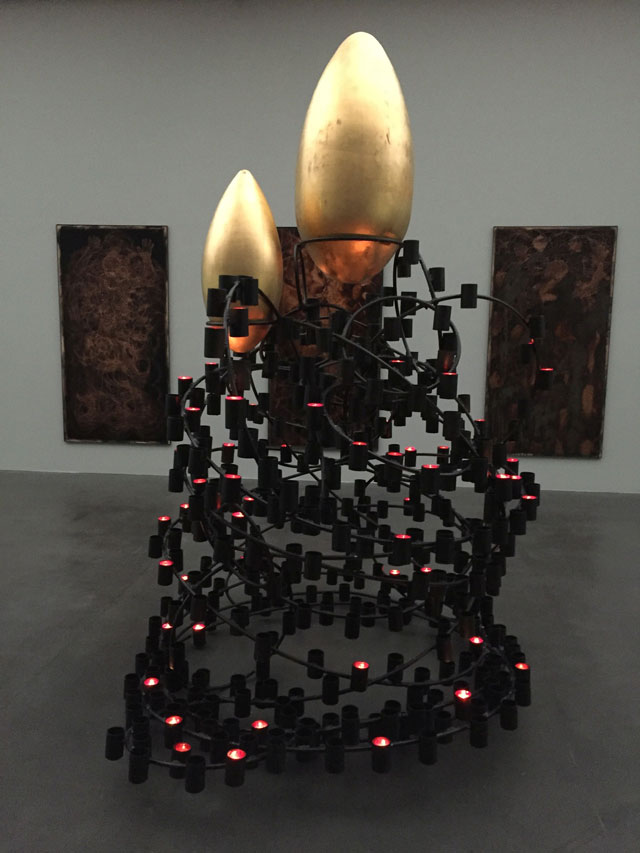 Michael Buthe. Holy Night of Virginity, 1992. 14 copper panels and one candelabra crowned with golden ovoids, 400 cm, copper panels 260 x 120 cm each. Kolumba, Cologne, installation view, Kunstmuseum Luzern, 2015.
Photograph: Haus der Kunst © VG Bild-Kunst, Bonn, 2016.
