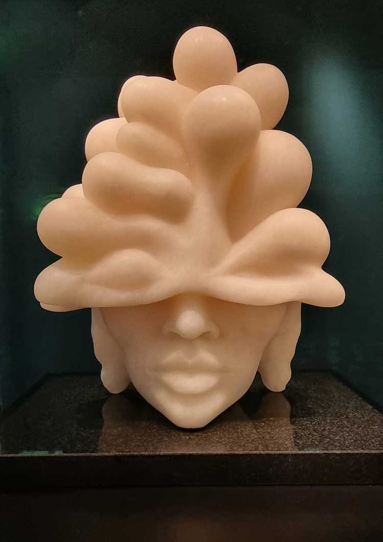 Sasha Constable, Under Cumuli, 2022. Pink alabaster and polished granite base, 41 x 40 x 25 cm.	© Sasha Constable.