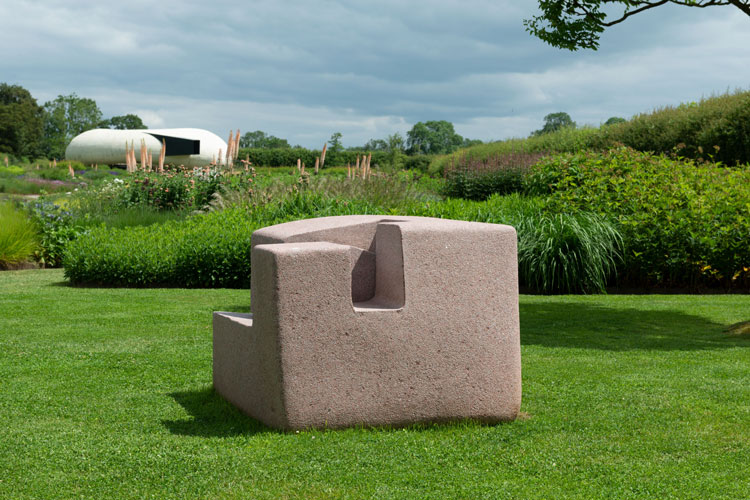 Eduardo Chillida, Harri VI (Stone VI), 1996. Granite, 92 x 132 x 115 cm (36 ¼ x 52 x 45 ¼ in). Installation view, Eduardo Chillida, Hauser & Wirth Somerset, 2021. Courtesy the Estate of Eduardo Chillida and Hauser & Wirth. Photo: Ken Adlard. © Zabalaga Leku. San Sebastián, VEGAP (2021).