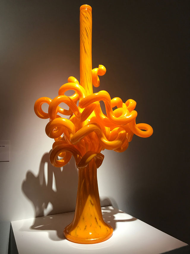 Dale Chihuly. Chrome Orange Venetian with Coils, blown glass, 1990. Royal Botanic Gardens, Kew, London 2019. Photo: Anna McNay.