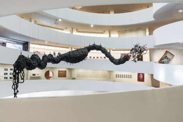 Chen Zhen. Precipitous Parturition, 1999. 50-foot-long inner-tube dragon. Installation view: Art and China after 1989: Theater of the World. Solomon R. Guggenheim Museum, New York, October 6, 2017—January 7, 2018. Photograph: David Heald