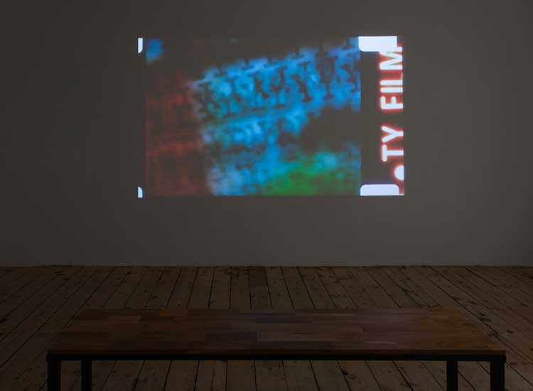 Installation view at TINA, London, E.E. Vonna-Michell, in collaboration with Henri Chopin, To Ray the Rays,1985. 16mm film transferred to video, sound, colour, 7 min 55 sec. Image courtesy of the artist and Jan Mot, Brussels. Photo: Corey Bartle-Sanderson.