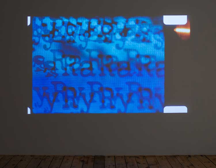 Installation view at TINA, London, E.E. Vonna-Michell, in collaboration with Henri Chopin, To Ray the Rays,1985. 16mm film transferred to video, sound, colour, 7 min 55 sec. Image courtesy of the artist and Jan Mot, Brussels. Photo: Corey Bartle-Sanderson.