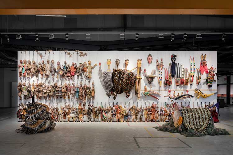 Documenta 15: Fondation Festival sur le Niger, Yaya Coulibaly, The Wall of Puppets, 2022, installation view, Hübner areal, Kassel, 13 June 2022. Photo: Maja Wirkus.