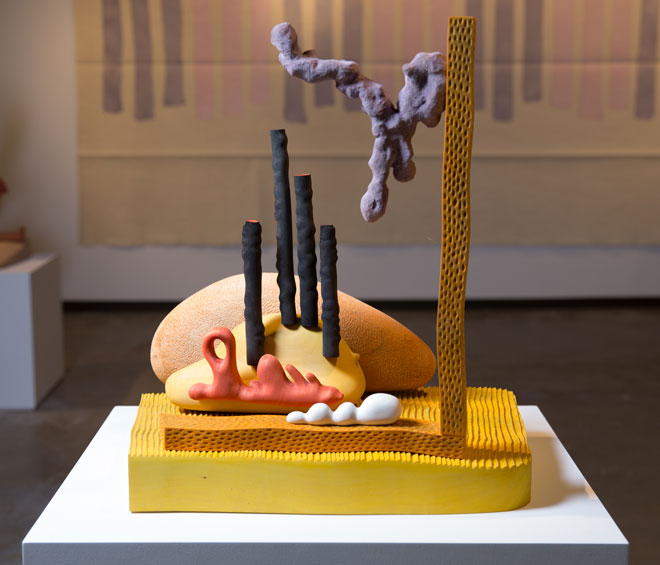 Casey Kaplan's booth at the Dallas Art Fair which featured works by Giorgio Griffa and Matthew Ronay.  Photograph: Daniel Driensky.