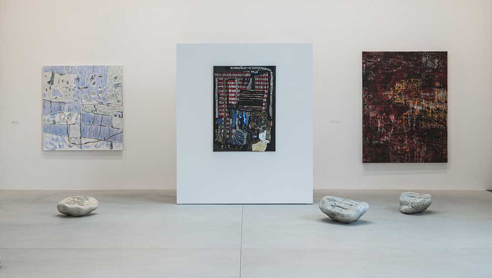 Erasure, installation view, Goodwood Art Foundation, featuring mixed-media paintings by Laís Amaral and carved soapstones by Solange Pessoa. Photo: Toby Adamson.