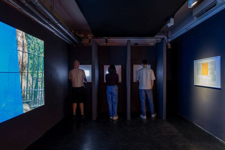 Ernest Edmonds, The Communication Game, 2025. Arduino microcontrollers, toggle switches and LED ligthboxes presented in custom-built booths. A new version of an ongoing project, begun in 1969, variable custom installation. Photo: Deniz Guzel.