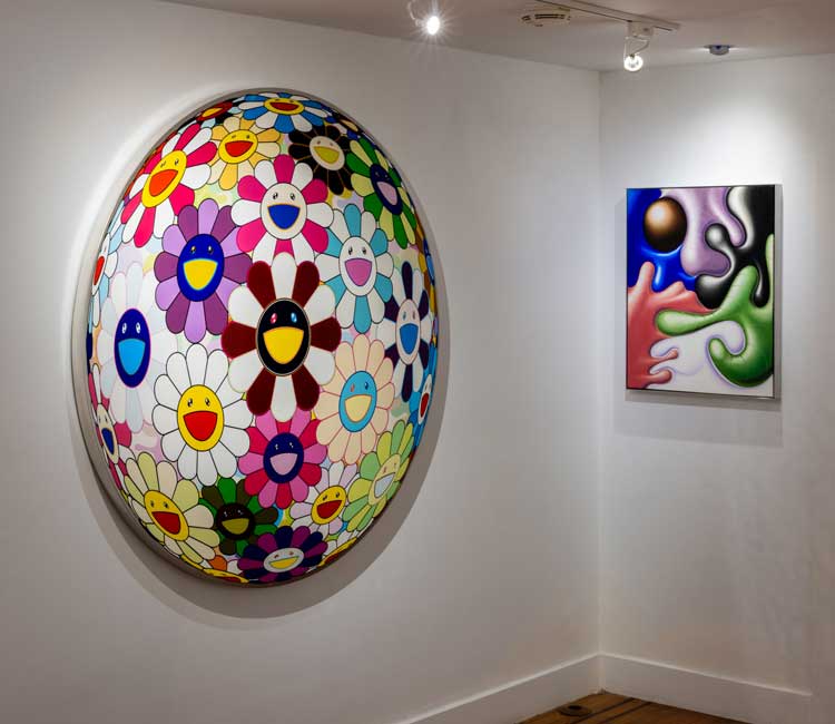 Left: Takashi Murakami, Flowerball Brown, 2008. Acrylic and platinum leaf on canvas
149.86 cm did (59 in dia); Right: Kenny Scharf, OOZ, 2000. Oil on canvas, 76.2 x 60.96 cm (30 x 24 in). Installation view, Expansive Change: Distortion as Dialogue in Modern & Contemporary Art, Leila Heller Gallery, New York, 2024. Photo: David Kaminsky.