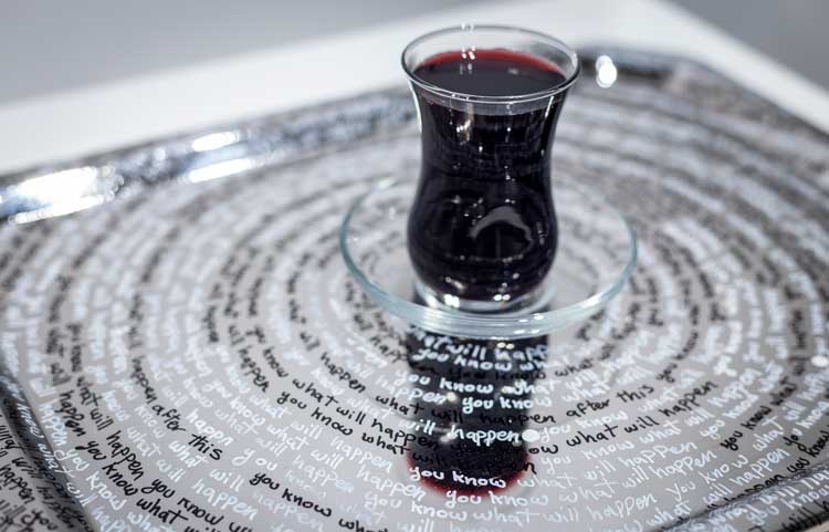 Saba Farhoudnia. You Know What Will Happen, 2022. Oil marker on stainless steel, Turkish tea cup, 15 x 12 in. Photo: Farzan Ghasemi.
