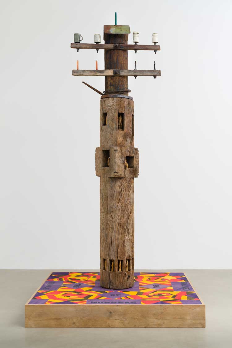 Danny Fox. The Centre of Earth, 2021. Wood, metal, fabric, wax, ceramic, 138 x 73 x 73 in (350.5 x 185.4 x 185.4 cm). Photo: Copyright the artist, courtesy of Saatchi Yates.