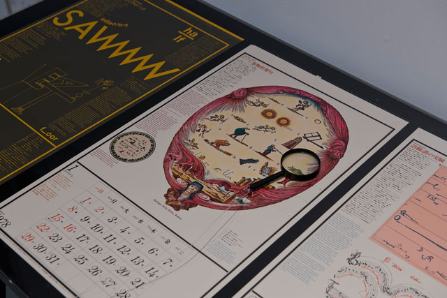 Installation view, showing pages from Alphabetum Acrobaticum (1978), a calendar by Jasia Reichardt and Kohei Suiguira, from Fluorescent Chrysanthemum Remembered, CCA Laznia, Gdansk, Poland. Photo: Paweł Jozwiak.