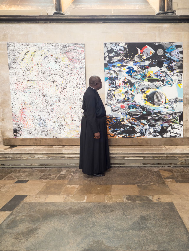 Miracles revealed - Salisbury Cathedral Chaplain. Kayode Ejibunu studies The Miracle of Thought (left) and The Miracle of the Deep (right). Photo: Ash Mills.