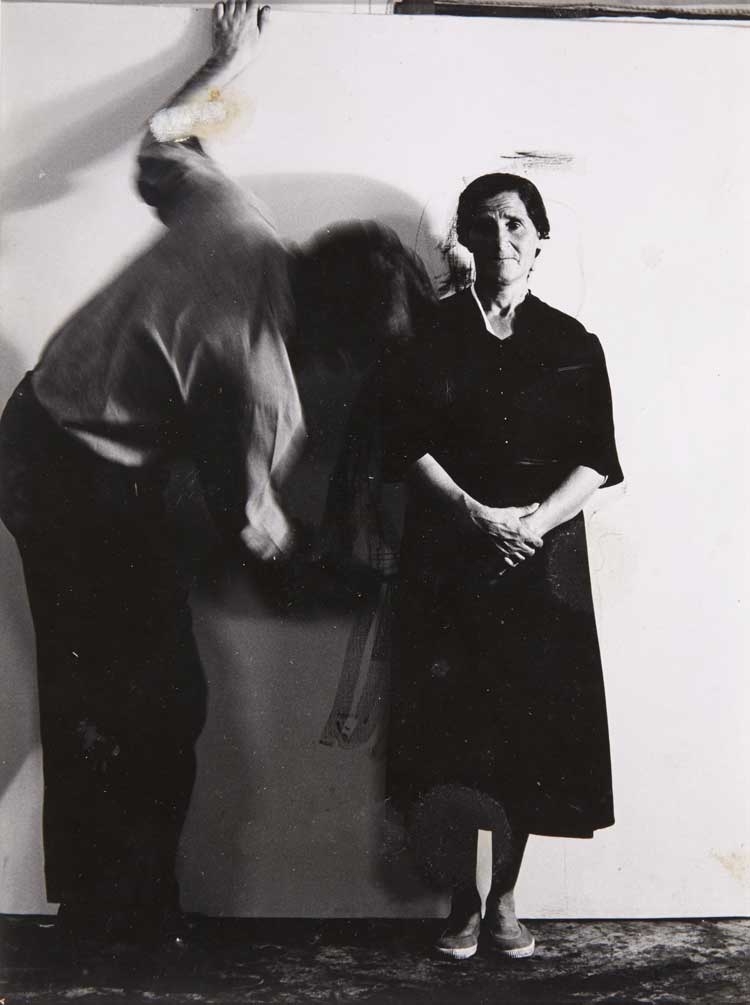 Photograph by Juan Dolcet. Incorporation of living figures into the canvas (Encarnación Heredia, suffering woman), Private Gallery, Madrid, 1963.