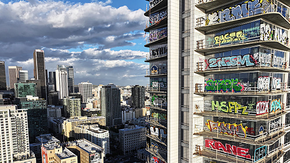 Oceanside Plaza, downtown Los Angeles, an abandoned luxury skyscraper development tagged with graffiti. Photo: Mario Tama/Getty Images.