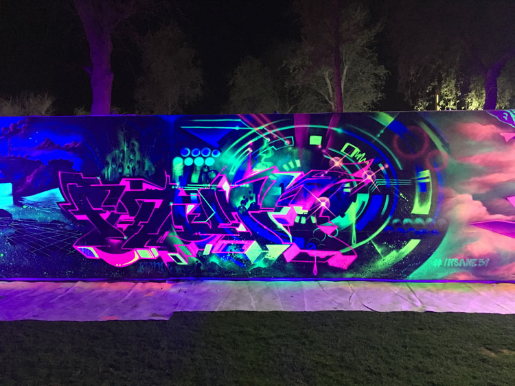 Toons One! Future. Part of the section painted for the Guinness World Record for the largest glow
in the dark painting, Soqr Park in Ras al Khaimah, UAE. Overall size 416.26 m² (4,480.58 ft²). Image courtesy the artist and Taylor Fine Art.