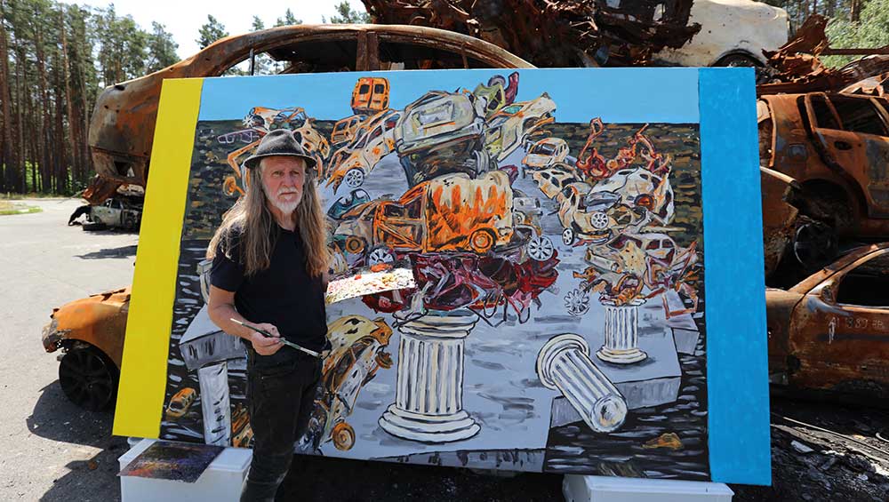 George Gittoes, painting outside in Bucha, Ukraine, 2022. © the artist.
