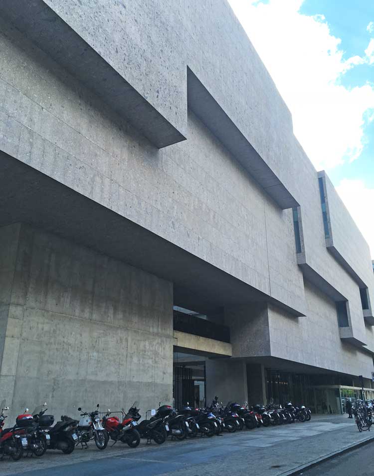 The School of Economics building at the Università Commerciale Luigi Bocconi in Milan. Building as landscape, it draws light down through incisions at ground level. Photo: Veronica Simpson.