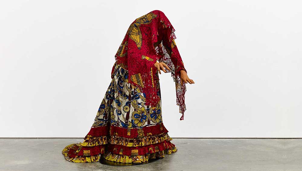 Yinka Shonibare. The Ghost of Eliza Jumel, 2015. Fibreglass mannequin, Dutch wax–printed cotton textile, and steel plate, 57 7/16 × 71 5/8 × 40 15/16 in. (146 × 182 × 104 cm). Courtesy James Cohan, New York. © Yinka Shonibare CBE. All Rights Reserved, DACS/Artists Rights Society (ARS), New York 2021. Photo: Stephen White.