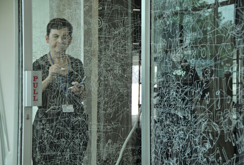 Gosia Wlodarczak. Frost Drawing For Kallang, 2011, image 2. Performative drawing on glass
(in situ), at the Old Kallang Airport, Singapore.