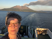 Ilana Halperin. Self portrait with Sakurajima. Photo: Ilana Halperin.