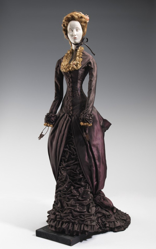 Christian Dior (French, 1905–1957). Doll (for gratitude train), 1949. Guillaume (French). Metal, plaster, hair, silk, straw, linen. The Brooklyn Museum Costume Collection at the Metropolitan Museum of Art.