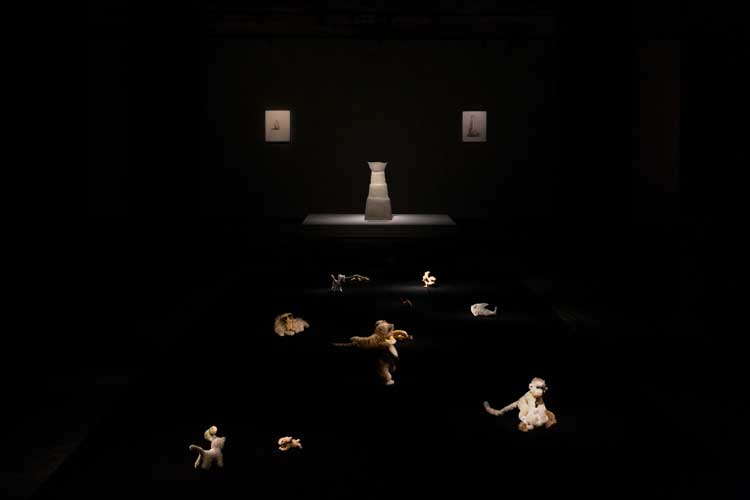 Installation view of the second Silk Room exhibition, Leiko Ikemura: When Animals Become Art at The Feuerle Collection. Plush toys. In the background Bride, patinated bronze, 98 x 45 x 31 cm approx. O.T. / Untitled, 1992, charcoal and pastel on paper, 47.5 x 3.5 cm. Ha, 1991, charcoal on paper, framed: 60 x 46.6 x 3.5 cm. Photo: Wai Kung. Courtesy the artist. © Leiko Ikemura and The Feuerle Collection.