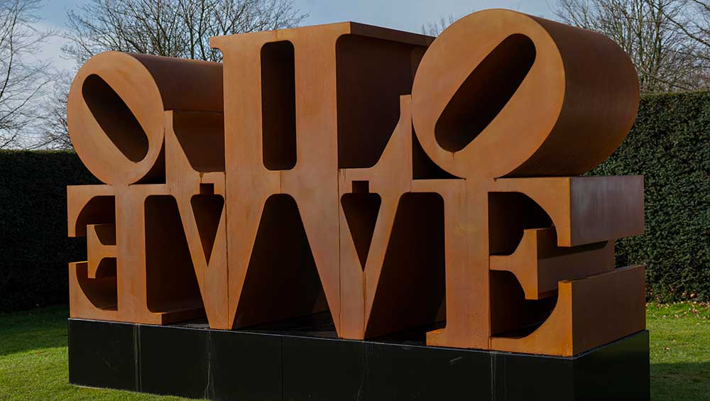 Robert Indiana, LOVE (Red Blue Green), 1966–1998, installation view at Yorkshire Sculpture Park, 2022. Photo: © Jonty Wilde, courtesy of Yorkshire Sculpture Park. Artwork: © 2022 Morgan Art Foundation Ltd./ Artists Rights Society (ARS), New York/DACS, London.