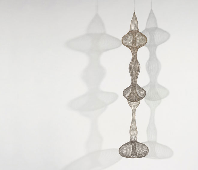 Ruth Asawa (American, 1926‒2013). Untitled (S.540, Hanging, Seven-Lobed, Interlocking Continuous Form within a Form), c1958. Brass and copper wire. The Shidler Family Collection. Artwork © Estate of Ruth Asawa.