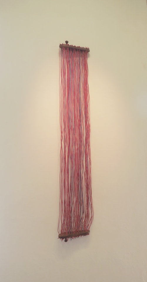 G R Iranna. Stretched Object. Electric Wire and Wood. 5 x 70 x 10.5 inches. Courtesy of the artist.