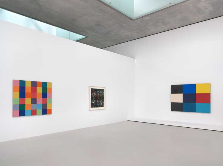 Ellsworth Kelly. From left: Sanary, 1952. Oil on wood, 51 ½ x 60 in (131 x 152 cm). Collection of Marguerite and Robert Hoffman; Spectrum Colors Arranged by Chance IX, 1953. Collage on paper, 38 ¼ x 38 ¼ in (97 x 97 cm). Private Collection; Méditerranée, 1951-1952. Oil on wood, nine joined panels, three in relief, 59 ¼ x 76 ¼ in (150 x 194 cm). Tate: Presented by the Artist and Jack Shear in honour of Sir Nicholas Serota (Tate Americas Foundation) 2021. All artworks © Ellsworth Kelly Foundation. Photo: Ron Amstutz. Courtesy: Glenstone Museum, Potomac, Maryland.