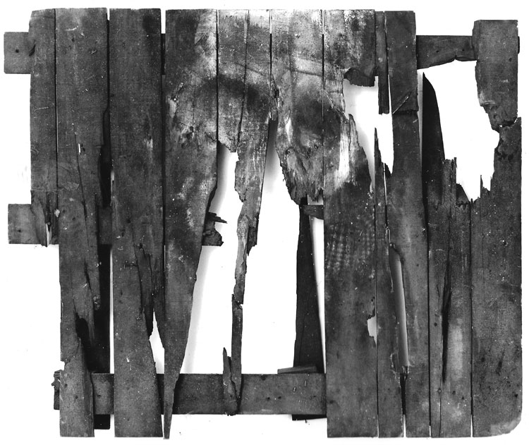Peter Kennard, Pallet, 1990. Oil, charcoal and dust on wood, 90 x 65 x 14 cm. © Peter Kennard. Courtesy the artist and Richard Saltoun Gallery.