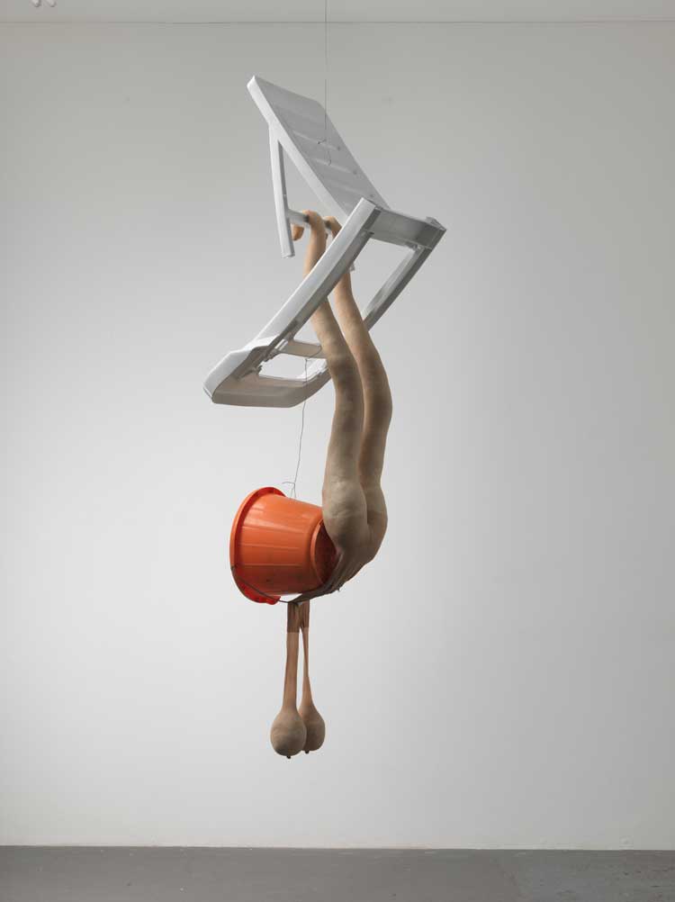 Sarah Lucas, Loungers #1, 2011. Tights, fluff, plastic bucket (orange), plastic lounger, 186 x 62.5 x 55.5 cm (73 ¼ x 24 ⅝ x 21 ⅞ in). © Sarah Lucas. Courtesy Sadie Coles HQ, London.