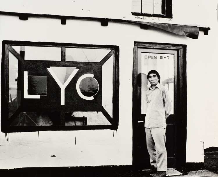 Li Yuan-chia standing at the porch of the LYC Museum and Art Gallery, featuring window designed by David Nash. Image courtesy of Li Yuan-chia