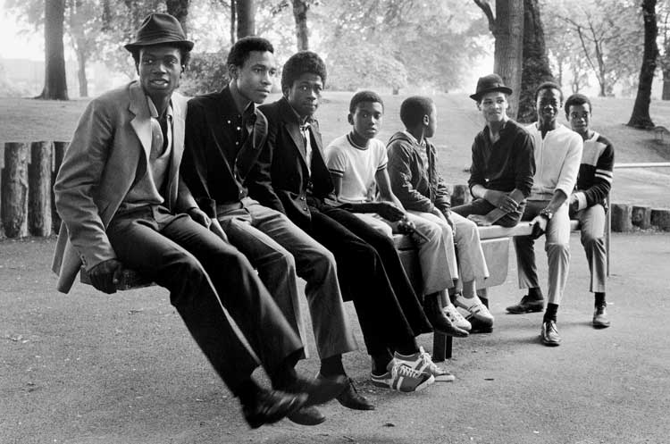 Vanley Burke. Young Men on a Seesaw in Handsworth Park, 1984. Courtesy Vanley Burke Archives.