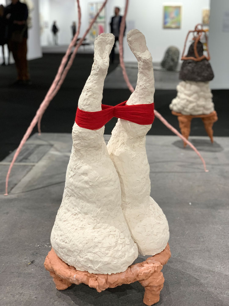 Sam Lucas, Head in the Bin, 2019. Ceramic, textile, H98 x W49 x L50 cm. Installation view, Taste Contemporary, ArtGenève, 2020. Image courtesy of Taste Contemporary.