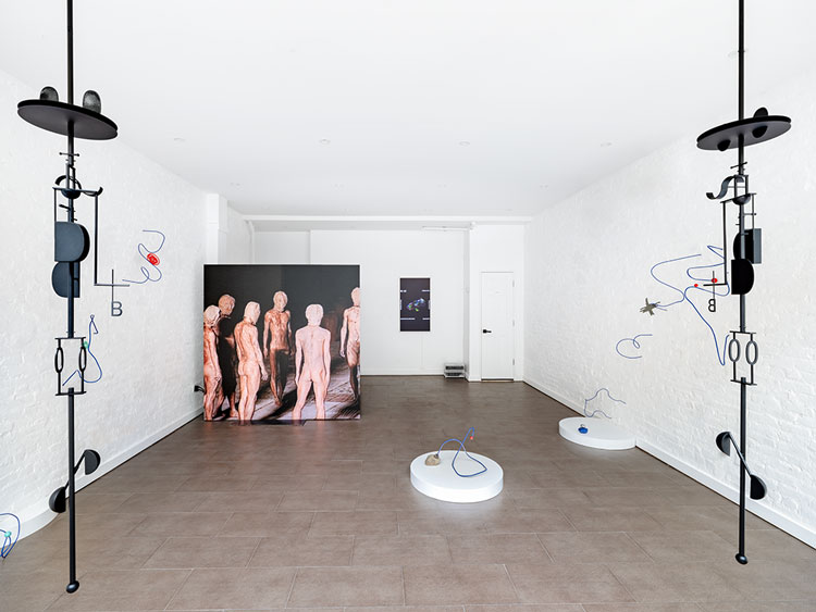 Left and right: Marlena Kudlicka, Black Discrete 00 and Black Discrete 01, 2025. Powder coated steel, each 90 3/5 × 11 4/5 × 11 4/5 in (230 × 30 × 30 cm). Installation view, Nguyen Wahed Gallery, New York, 2025. Photo courtesy Nguyen Wahed Gallery.