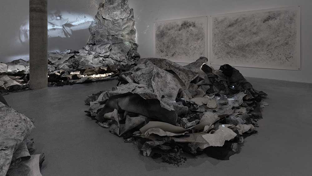 Emma McNally, The Earth is Knot Flat, 2024. Graphite, paper, kaolin, gum arabic. Installation view, Drawing Room/Tannery Arts, London. Photo: Eva Herzog.